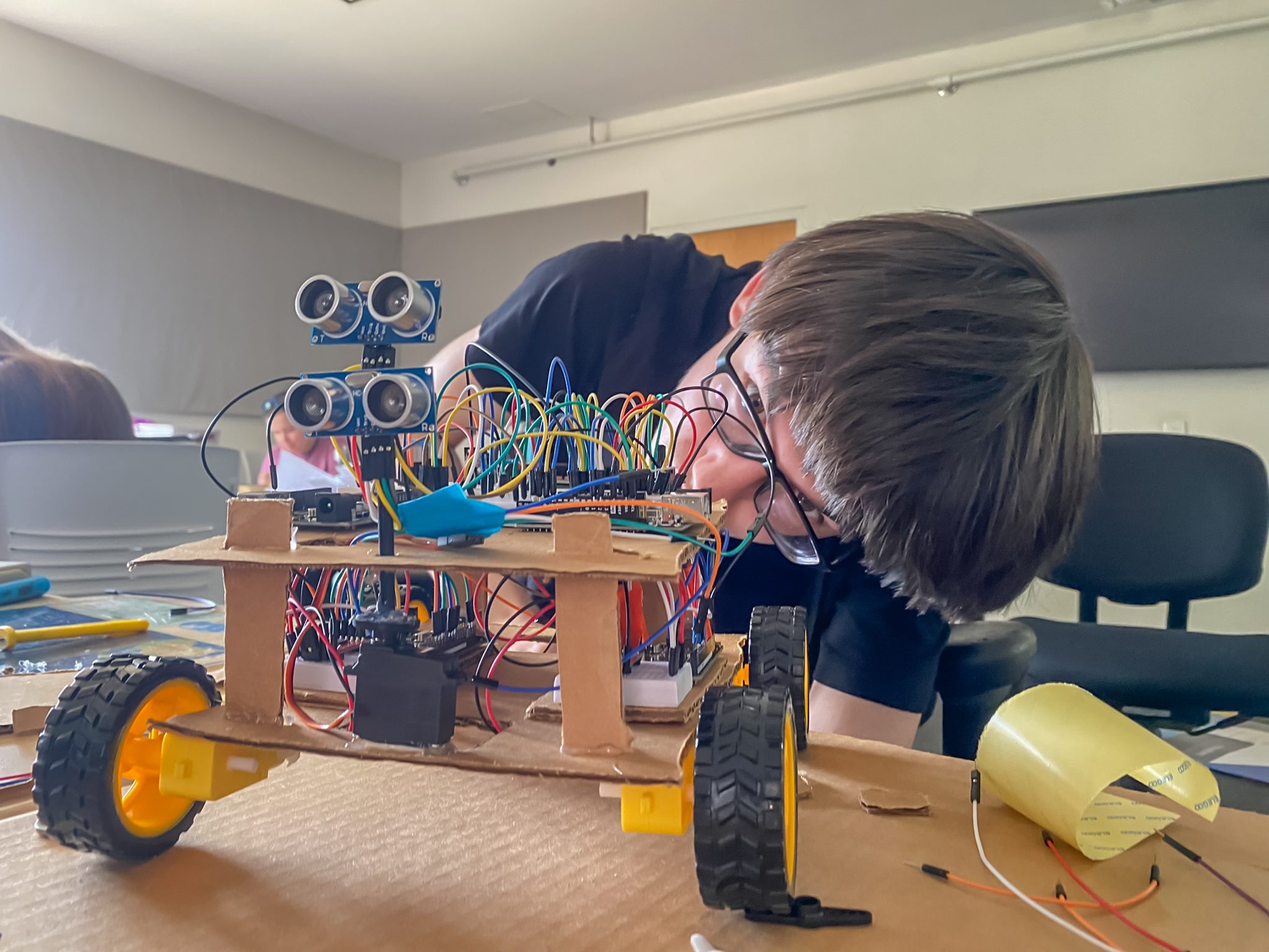 Technology and Design Student with Robot 2023